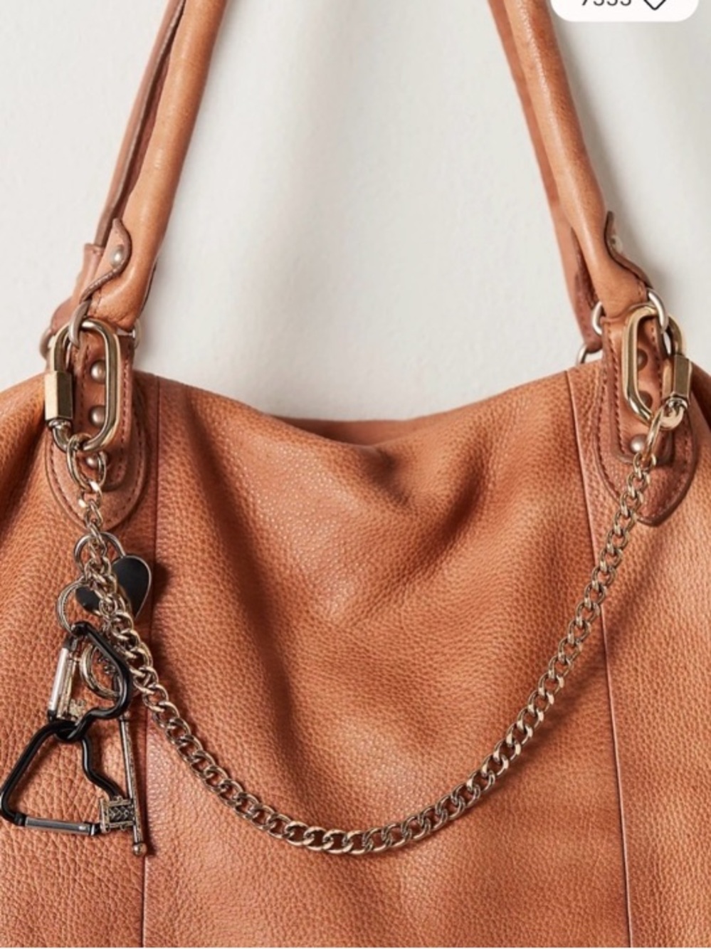 FREE PEOPLE Charmed Swag Bag Charm in Shiny Gold